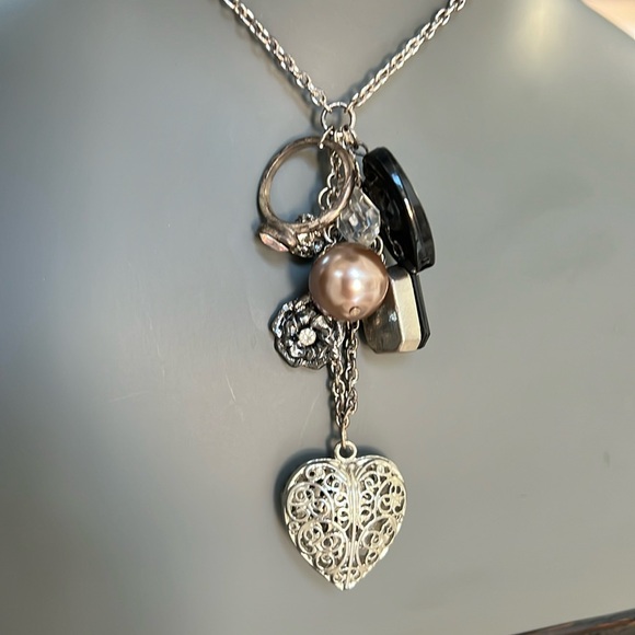 Long silver toned necklace with 8 charms in black and silver heart bead ring - Picture 1 of 9